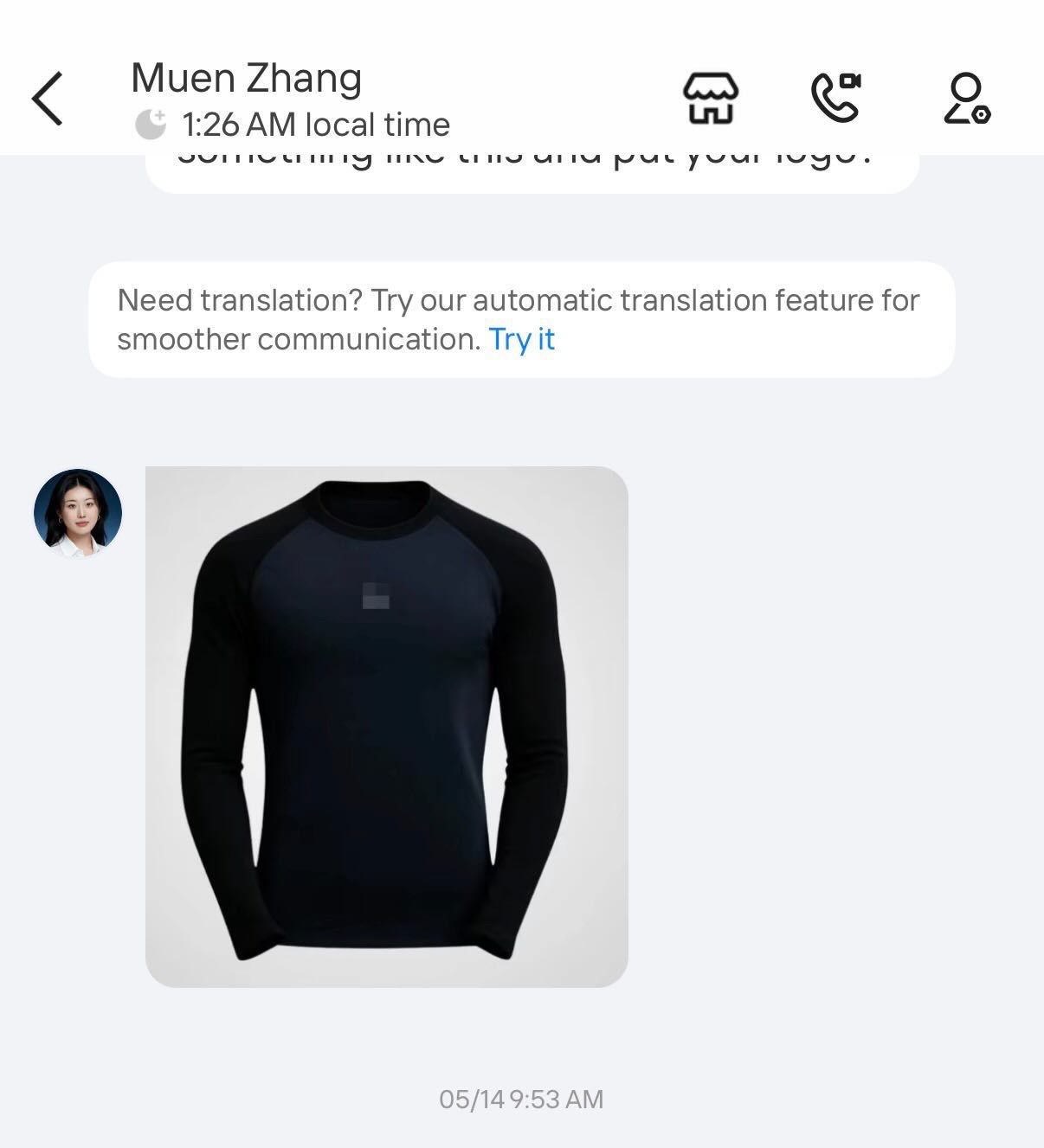 Supplier chat showing a black baselayer image resembling the ManasluClo Hinoko baselayer